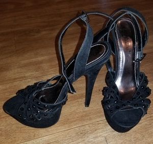 Nwot black strap high heels.